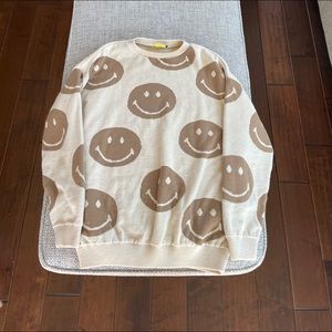 smiley face sweater